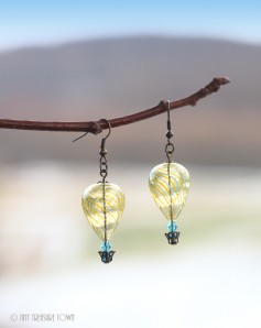 Heißluftballon Ohrringe - Bronze Gelb Blau Transparent