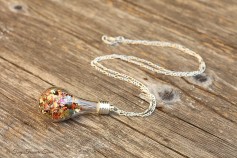 Magische Flöckchen Kette - Metallisch bunt und silberfarben - Tropfenform