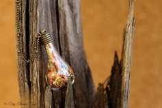 Magische Flöckchen Kette - Metallisch bunt und bronzefarben - Tropfenform